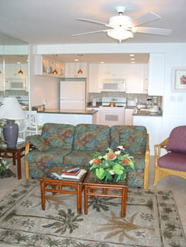 Living room and kitchen of 1-bedroom Unit A-15 at Napili Point Resort, Maui, Hawaii