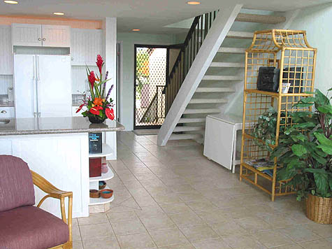 Living room, kitchen, entry in 2-bedroom Unit C-11 at Napili Point Resort, Maui, Hawaii